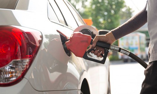 Someone is refilling their car with petrol.